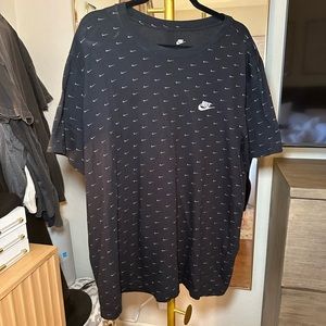 Men's black Nike graphic swoosh shirt